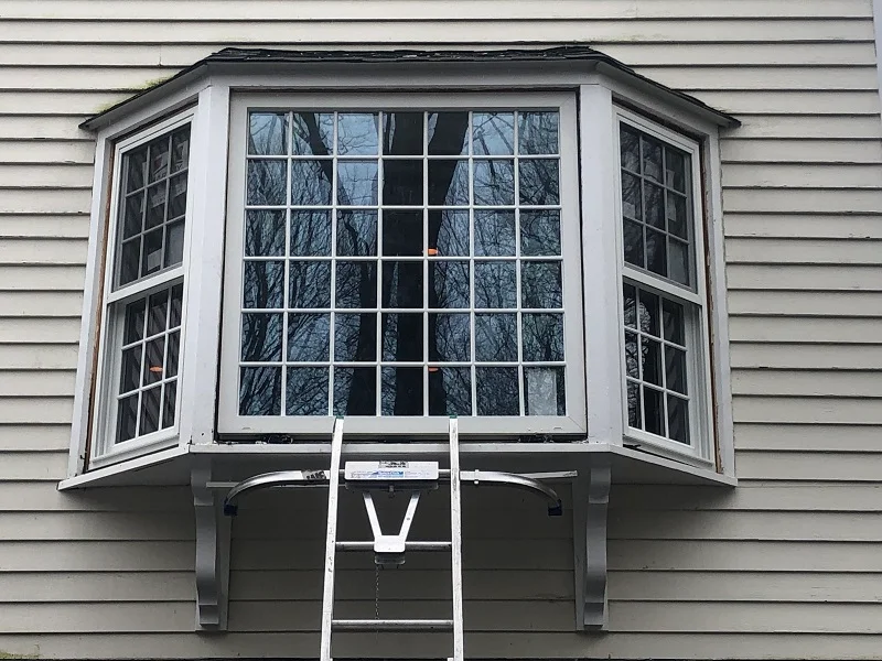 Replacing a picture window and double hungs inside a bay window in Redding, CT